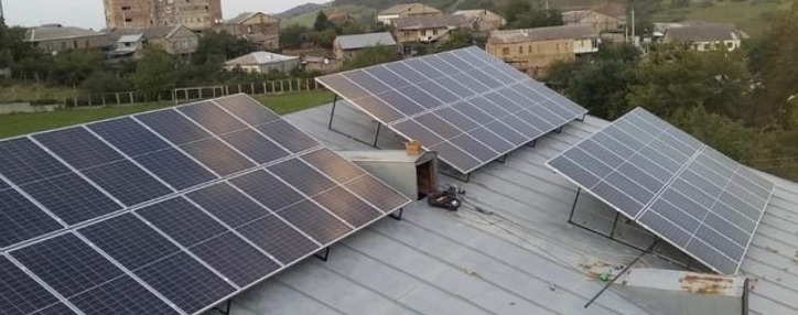 Yerevan municipality installing solar panels on roofs of apartment buildings 	